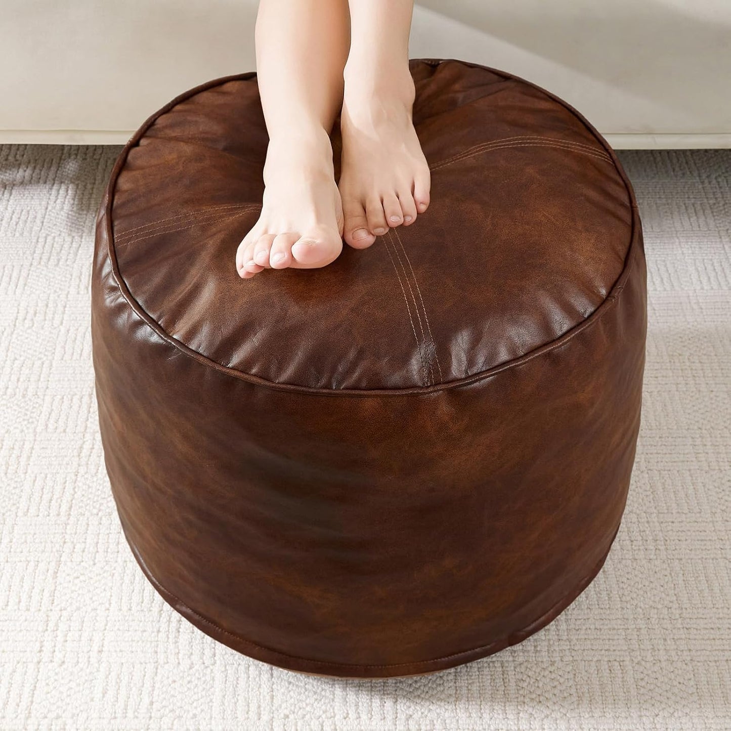 HIGOGOGO Round Stuffed Pouf Ottoman, Pu Leather Poufs with Foam Chunk Filling, Furry and Fluffy Pouf Foot Stool Storage Ottoman, 20 X 15 Floor Poufs Foot Rest for Living Room,Dark Brown
